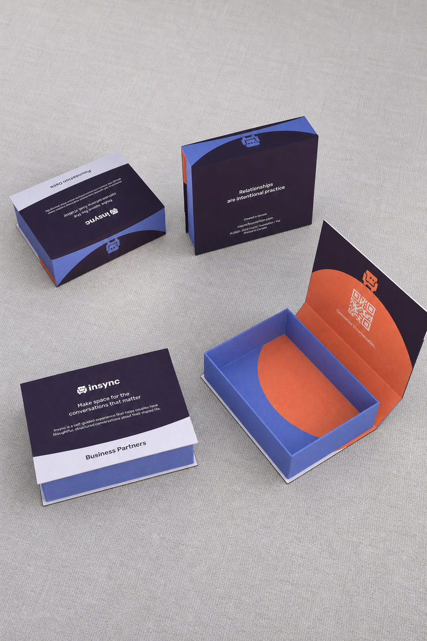 A set of branded presentation boxes and an insert card for 'insync' displayed on a neutral gray textured surface. The packaging features a dark navy blue base with bright blue and orange geometric accents, and white text sections.